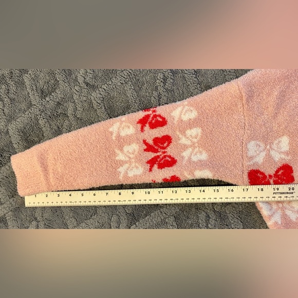 Francesca's Collections Blush V-Neck Sweater with Red and White Bow Pattern - Picture 7 of 9